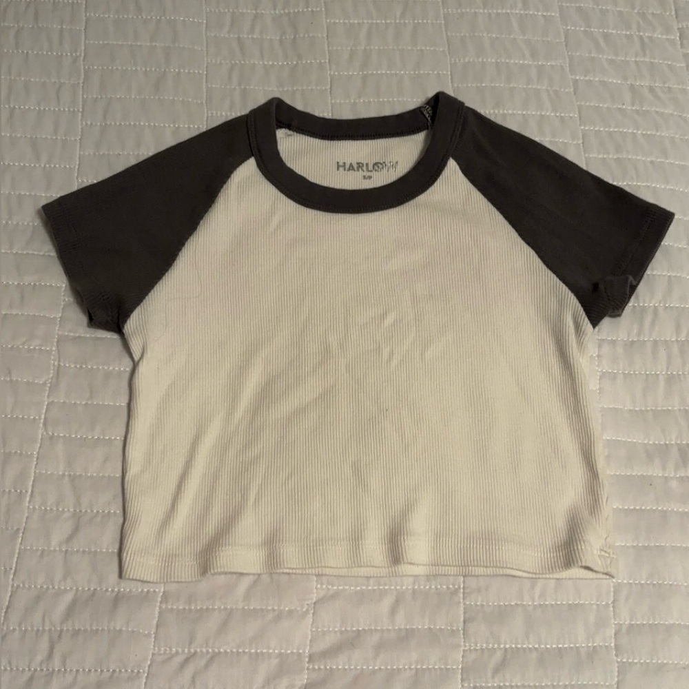 cream crop top with dark grey sleeves